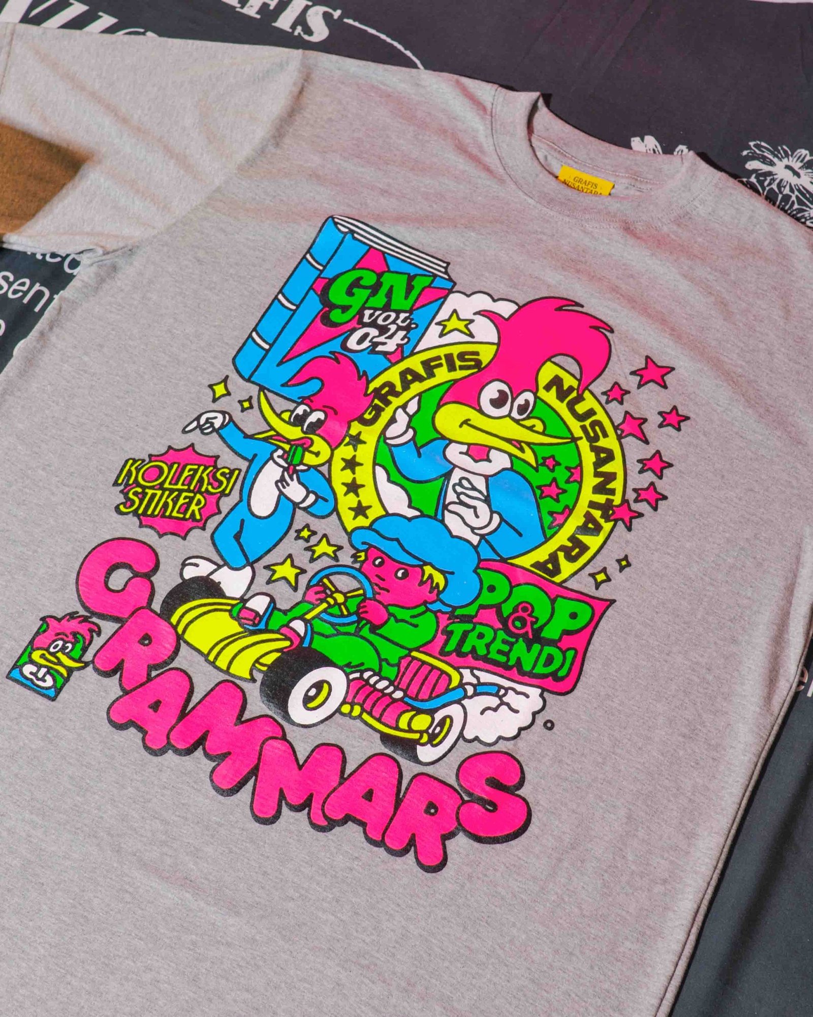 T-shirt collaboration between Grafis Nusantara and Grammars, featured during the book launch and showcase (Aan, Grammars, 2025)