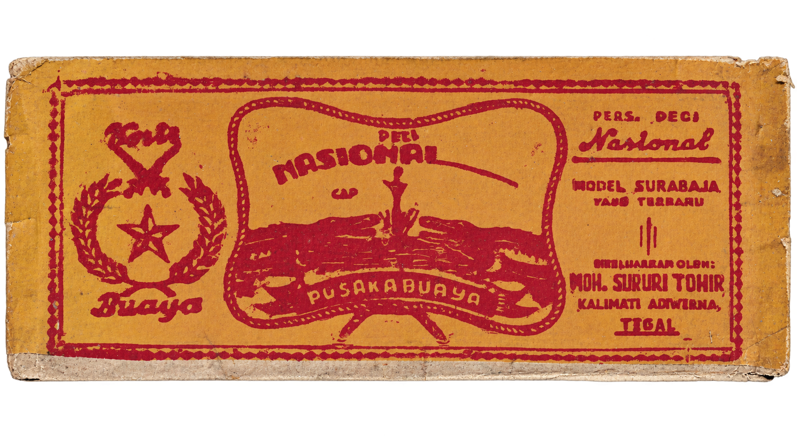 This printed paper label from the Grafis Nusantara Collection features the Deci Nasional cap Pusaka Buaya, titled 'Model Surabaja yang terbaru' (the newest Surabaya model), issued by Pers. Deci Nasional and created by Moh. Sururi Tohir in Kalimati, Adiwerna, Tegal.